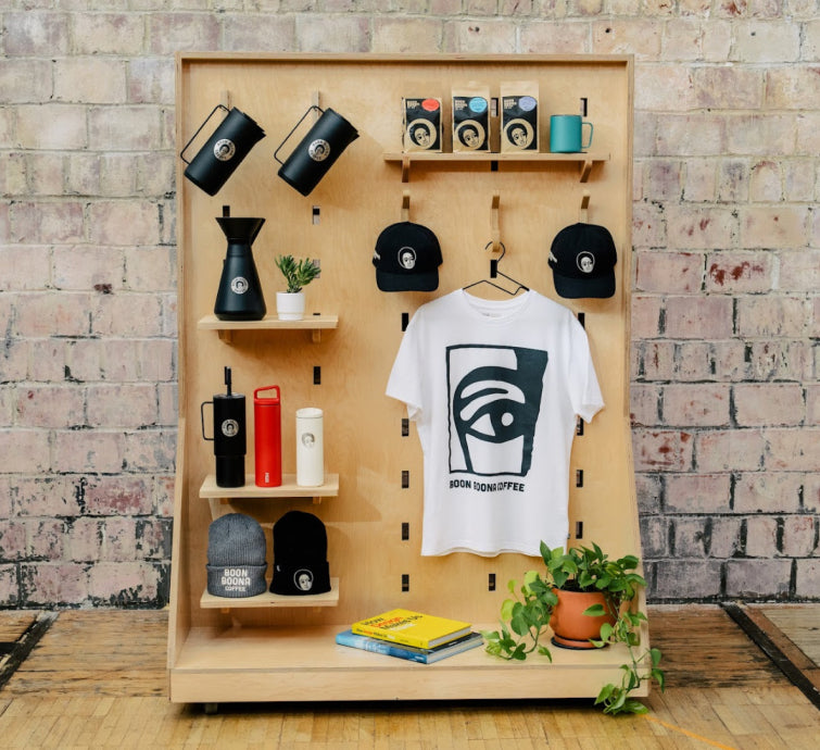 A collection of customized MiiR products in front of a brick wall